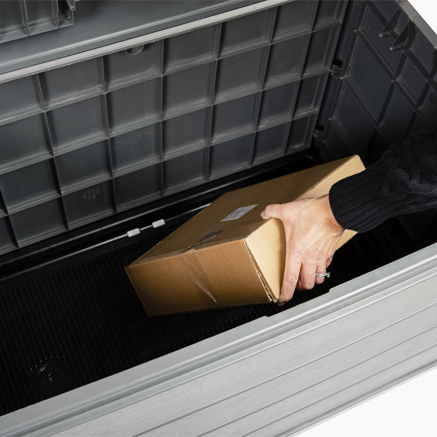 Delivery box with package being placed inside