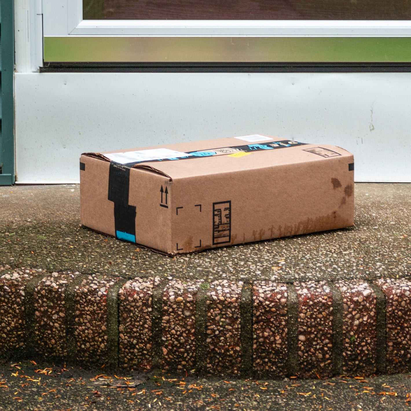 Package on a wet step area by the front door
